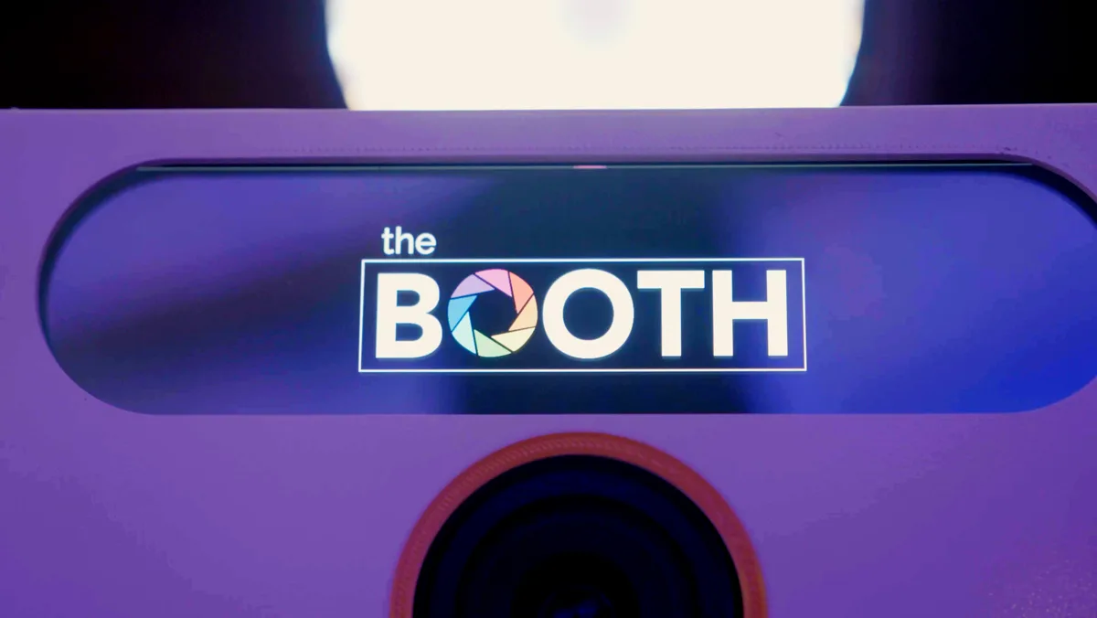 The Booth's billboard screen showing The Booth