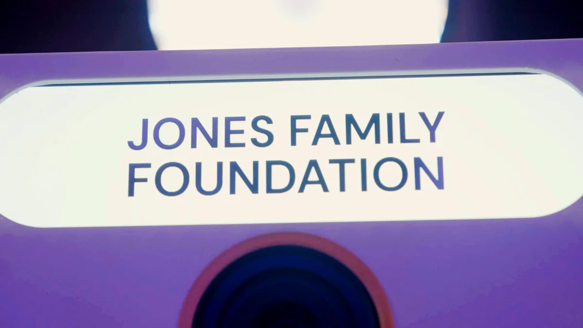 The Booth's billboard screen showing Jones Family Foundation